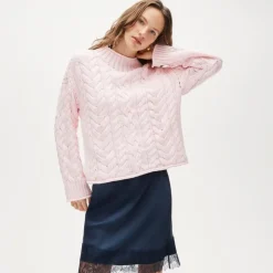 2025 Rollneck™ cable-knit sweater