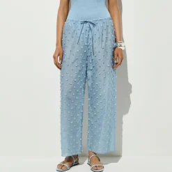 Beach pant with pom-poms