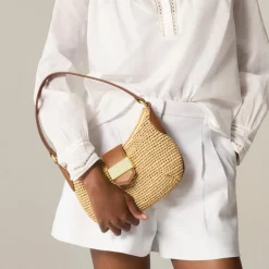 Berkeley buckle shoulder bag in handknotted straw
