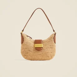 Berkeley buckle shoulder bag in handknotted straw