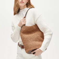 Berkeley handknotted bucket bag in raffia