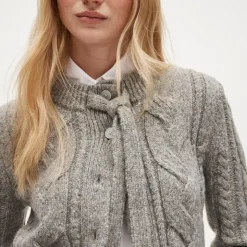 Cable-knit bow cardigan in wool blend