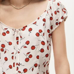 Cap-sleeve top in cherry print