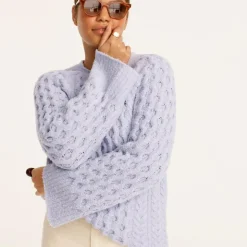 Cotton-blend bouclé cable-knit sweater