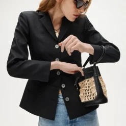 Drawstring bag in straw and leather