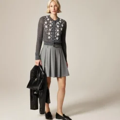 Loose-knit cardigan with floral embellishments