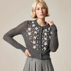Loose-knit cardigan with floral embellishments