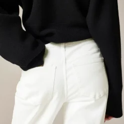 Lower-rise full-length slim-wide jean
