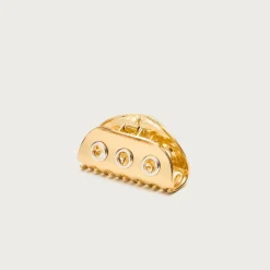 Metallic grommet claw hair clip