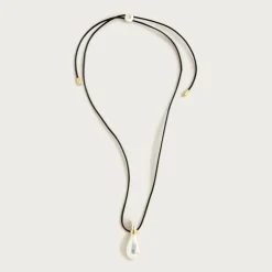 Metallic pendant necklace with leather cord