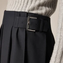 Pleated mini skirt with buckle detail