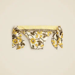Side-tie string bikini bottom in daffodil daze block print